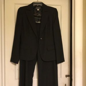 Women’s black with small white pocko dot suit
